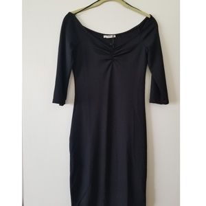 Super cute plain, black fitted dress